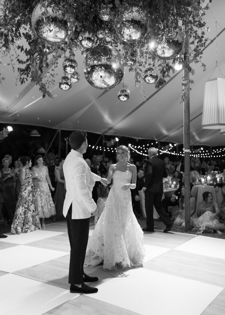 bride and grooms first dance during their reception