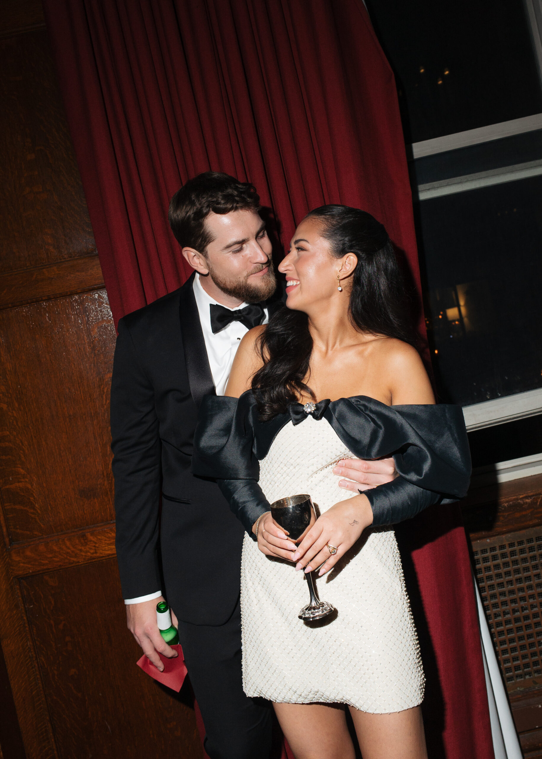 Bride and groom in the hotel kansas city tudor ballroom at their wedding reception